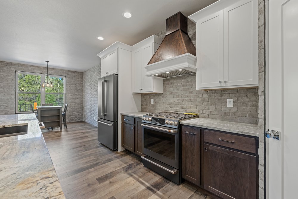 Range and hood in the Paper Birch Way kitchen