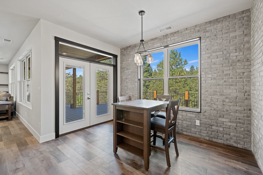 Dining nook with glass doors to the outside