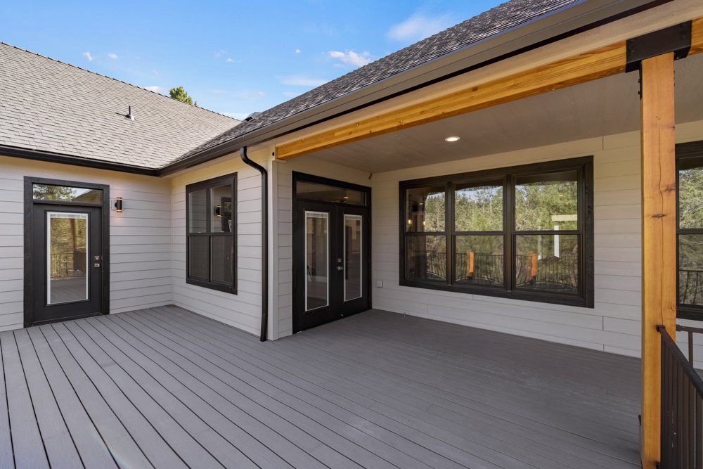 Covered rear deck at the Paper Birch Way home