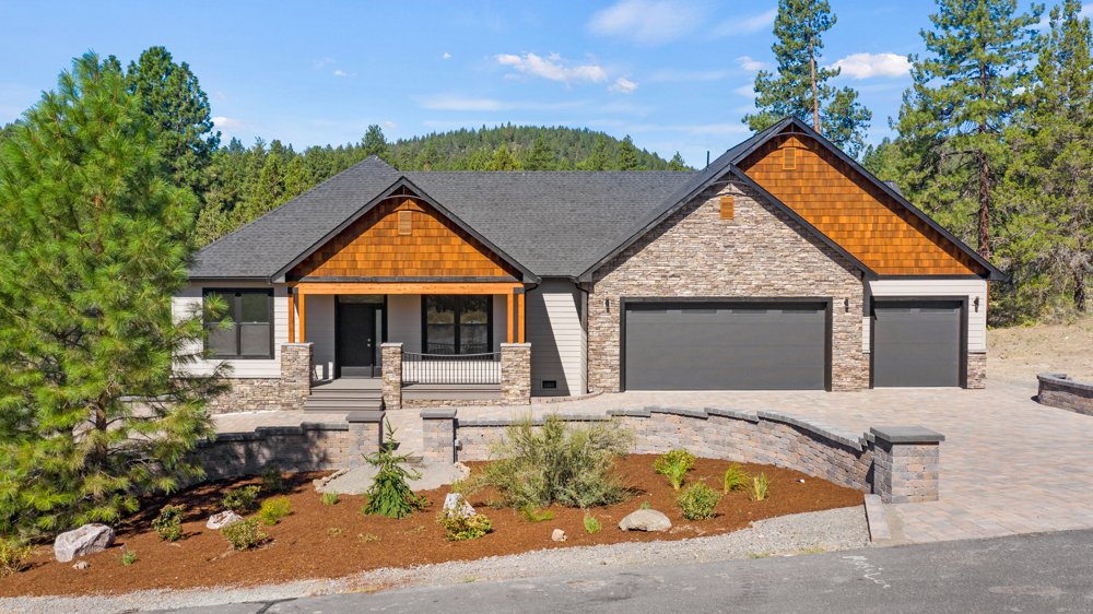 Angled exterior view of the Paper Birch Way home and landscaping