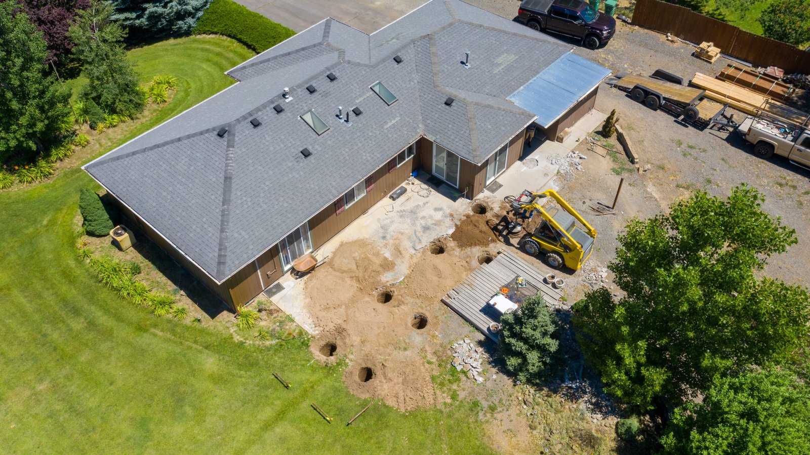 Aerial view of the home during patio preparation