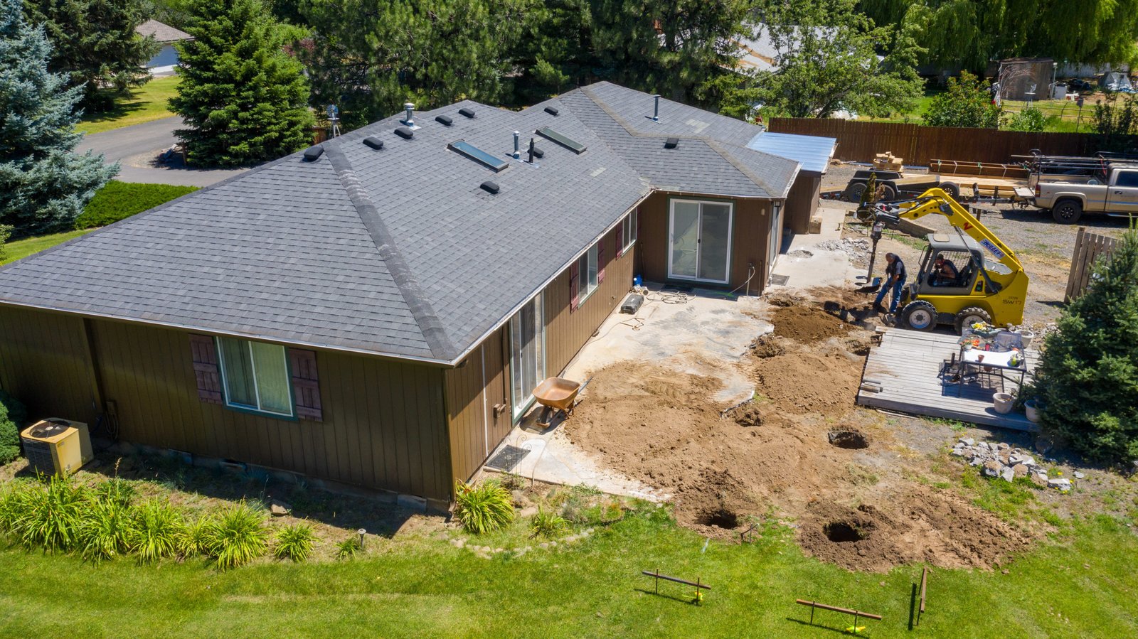 Aerial view of the home and patio work area