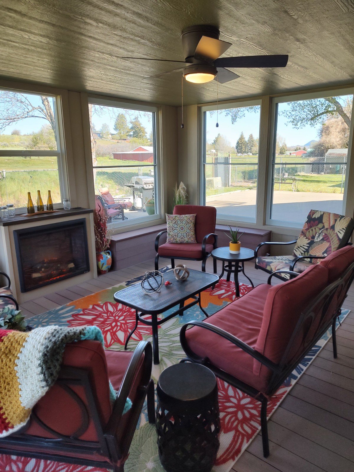 Another view of the enclosed porch seating area