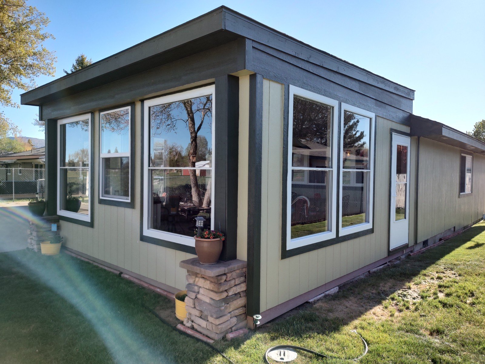 Exterior of the enclosed porch addition with large windows