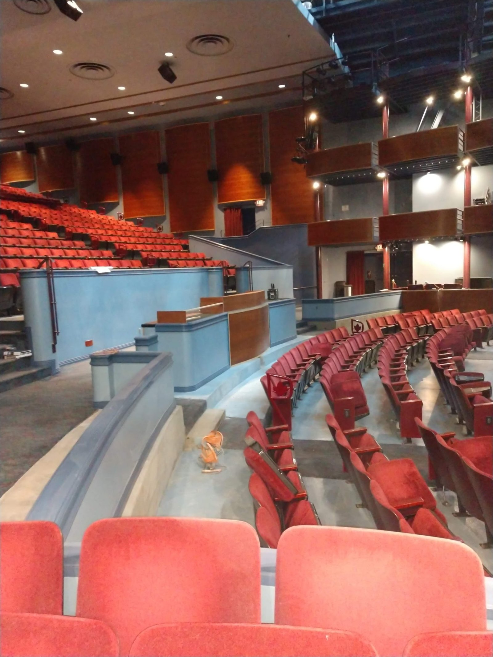 Interior of the Ross Ragland theater with red auditorium seating
