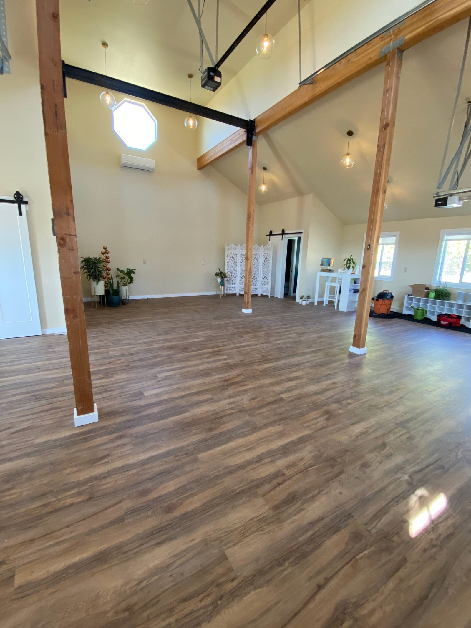 Studio interior viewed toward the far wall