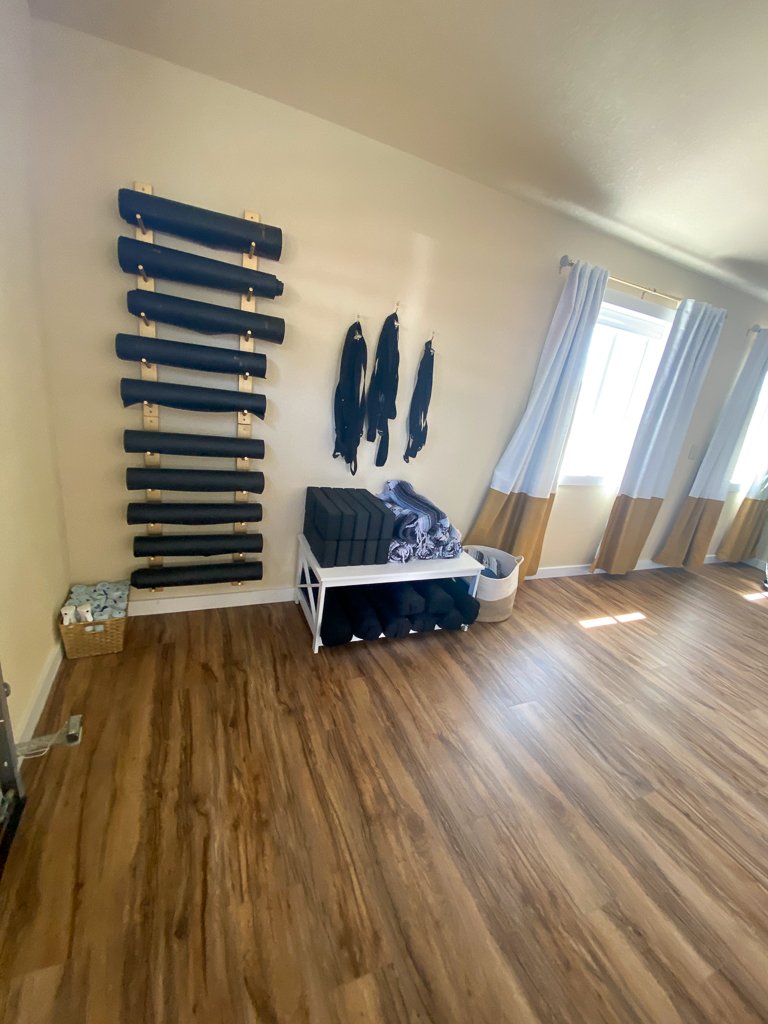 Studio corner with yoga equipment