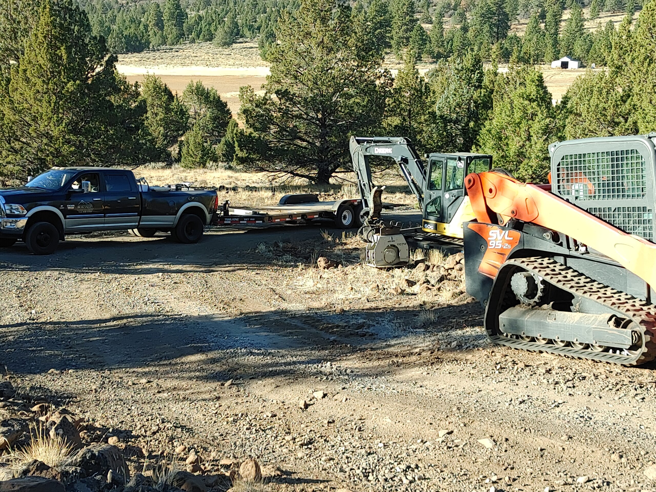 Bear Valley trucks and equipment staged at a Southern Oregon jobsite