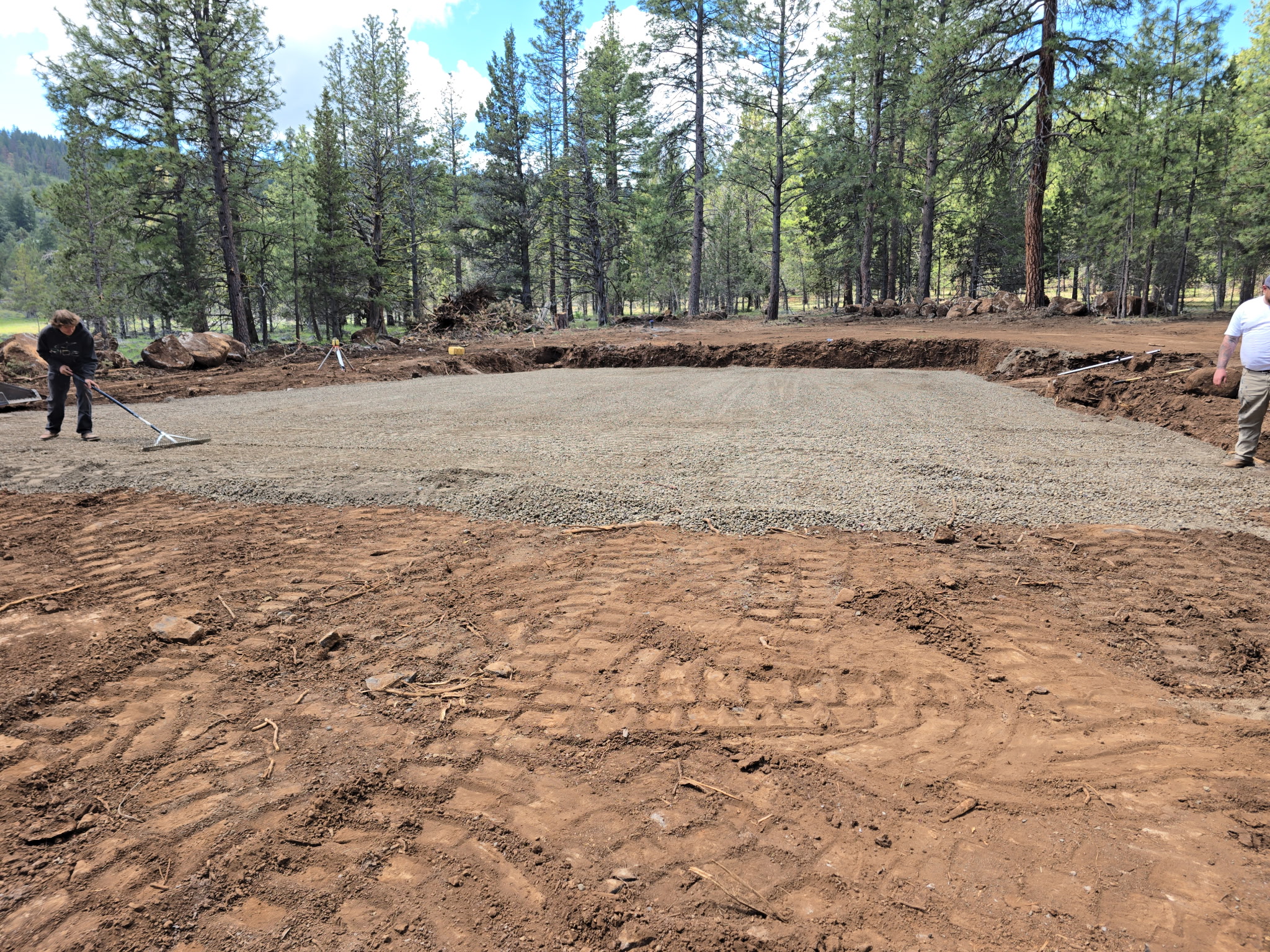 Prepared gravel building pad on a wooded Southern Oregon property